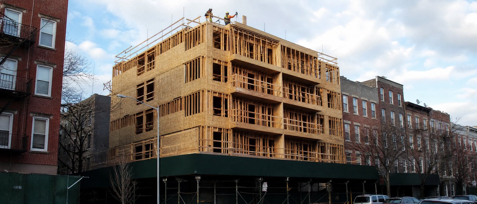 Multi-story wood-frame building under construction in New York City